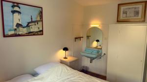 Ένα ή περισσότερα κρεβάτια σε δωμάτιο στο De Boem