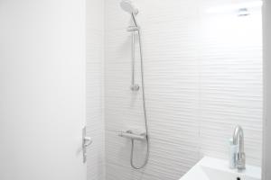 a bathroom with a shower and a sink at in Central Sesvete One in Sesvete