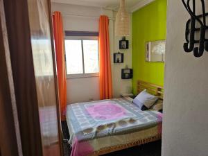 Giường trong phòng chung tại Casa Rita La Caleta de Arico