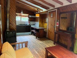 Kuchyň nebo kuchyňský kout v ubytování Cabañas Frente al Lago Calafquén