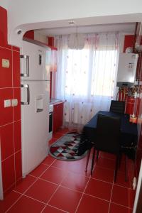 Kuchyň nebo kuchyňský kout v ubytování Apartment Centrul Vechi-Târgul de Crăciun