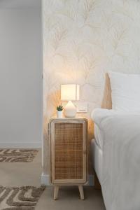 En eller flere senge i et værelse på Little Penthouse Fuengirola + 41 billeder