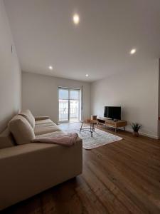 Μια τηλεόραση ή/και κέντρο ψυχαγωγίας στο Sea and Sand Apartment