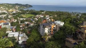 an aerial view of a town next to the ocean at Villa Los Corales in Sayulita