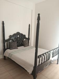 Ένα ή περισσότερα κρεβάτια σε δωμάτιο στο Cosy and Elegant apartment