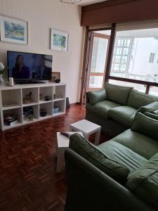 TV a/nebo společenská místnost v ubytování O Rincón de Paco