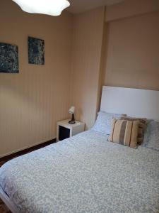 Postel nebo postele na pokoji v ubytování O Rincón de Paco