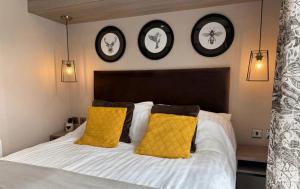 Ένα ή περισσότερα κρεβάτια σε δωμάτιο στο Vyvyenne Lodge