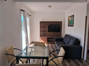 Un lugar para sentarse en Apartamento Lagoa da Conceição