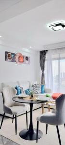 Posezení v ubytování Indesign makumbi Apartment