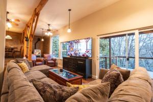 a living room with a couch and a tv at Historic Mountain Retreat - Near Boreal - 3 Kings in Emigrant Gap