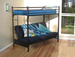 a black bunk bed in a room with a window at Haehostel in Bethlehem