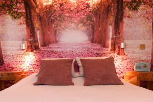 Ένα ή περισσότερα κρεβάτια σε δωμάτιο στο Just a Dream