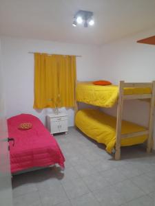 Postel nebo postele na pokoji v ubytování Casa en la Punta San luis