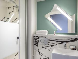 Phòng tắm tại ibis budget Reims Thillois