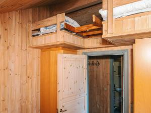 a room with two bunk beds and a door at 6 person holiday home in Hovborg in Hovborg