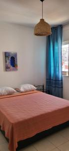 Ένα ή περισσότερα κρεβάτια σε δωμάτιο στο Apartment in the heart of Rabat-private parking & Wi-Fi