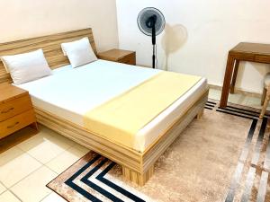 Una cama o camas en una habitación de Maison Toutaf