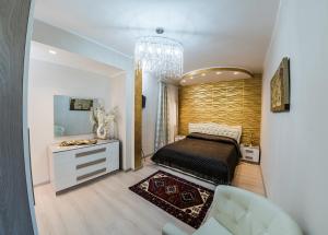 Ένα ή περισσότερα κρεβάτια σε δωμάτιο στο Ariston Suite