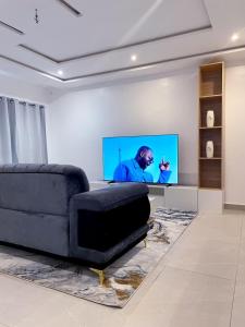 TV a/nebo společenská místnost v ubytování Appartement meublé 2 chambre salon