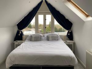 En eller flere senge i et værelse på The Forge