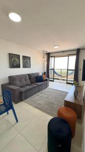 a large living room with a couch and a table at (1409) Studio Conforto Urbano com toque de Mar in Vinhais +72 photos