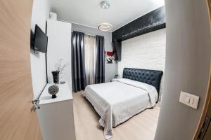 Ένα ή περισσότερα κρεβάτια σε δωμάτιο στο Ariston Suite +27 φωτογραφίες