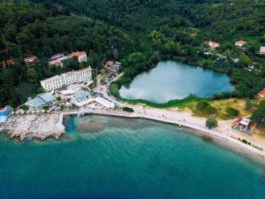 an aerial view of a resort and a lake at Apartment Mani in Koper