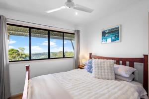 Ένα ή περισσότερα κρεβάτια σε δωμάτιο στο Blackall Bliss Hinterland Retreat