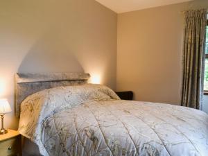 Ένα ή περισσότερα κρεβάτια σε δωμάτιο στο Perch Hall Cottage