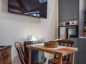 Kuchyň nebo kuchyňský kout v ubytování Maisie's Stable