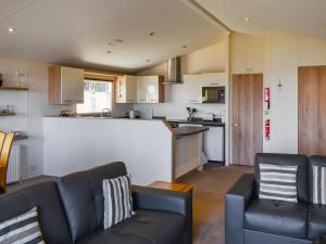 Η κουζίνα ή μικρή κουζίνα στο Sunrise Lodge