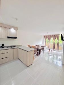Kuchyň nebo kuchyňský kout v ubytování Apartamento Lotus 203 - Cantón militar Jaime Rooke