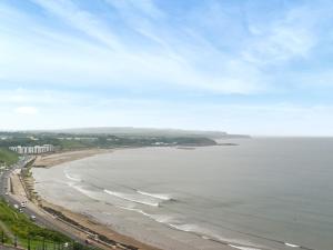 an aerial view of a beach and the ocean at Denelea Studio 1 - Uk49952 in Scarborough +2 photos