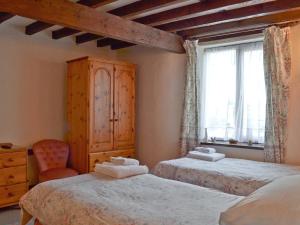 Voodi või voodid majutusasutuse Stable Cottage - W40643 toas +6 fotot