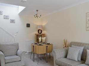 Et opholdsområde på Song Bird Cottage