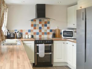 Kuchyň nebo kuchyňský kout v ubytování Lilly's + 10 fotografií