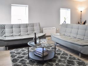 a living room with a couch and a table at Apartment 4 - Uk50138 in Stoke on Trent