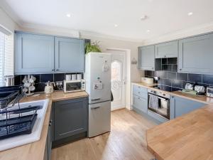 Kuchyň nebo kuchyňský kout v ubytování Mayglen