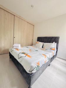 Postel nebo postele na pokoji v ubytování Apartamento en Ibagué 204 - Cantón militar Jaime Rooke