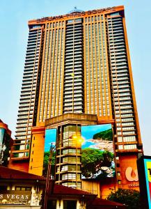 a large building with a mural on the side of it at Max Suites At Barjaya Times Square Kl in Kuala Lumpur