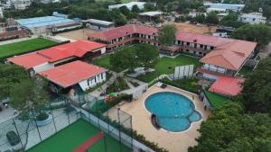 an aerial view of a house with a swimming pool at Ayana Resorts in Hyderabad