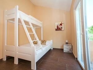 Poschodová posteľ alebo postele v izbe v ubytovaní Apartments Urban Wild