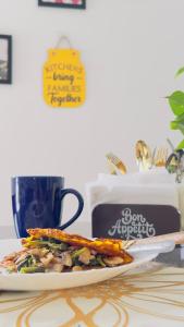a plate of food sitting on a table at ABN Stays in Anjuna