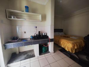 Ένα ή περισσότερα κρεβάτια σε δωμάτιο στο Guest friendly home