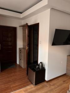 TV a/nebo společenská místnost v ubytování CitiMarina56 + 9 fotografií