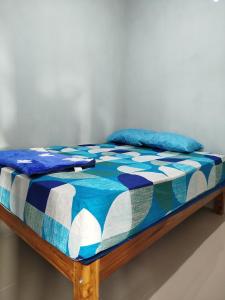 Ένα ή περισσότερα κρεβάτια σε δωμάτιο στο Bromo Jay House Homestay II