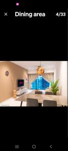 a picture of a living room with a dining area at Eaton kl,2R1B,klcc,500mbps,2-4pax in Kuala Lumpur