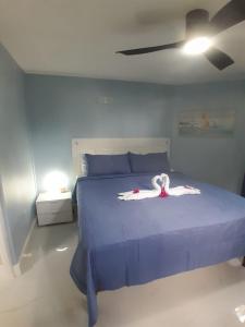 Ένα ή περισσότερα κρεβάτια σε δωμάτιο στο Beachview 1 Bedroom 4 at Sandcastles