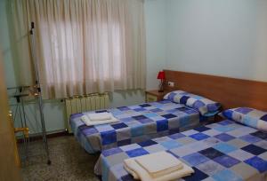 Postel nebo postele na pokoji v ubytování CASA LA FÀBRICA + 26 fotografií